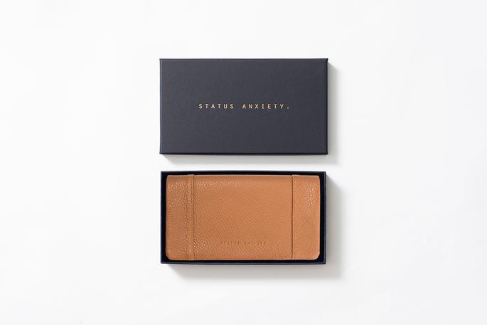 status-anxiety-some-type-of-love-wallet-tan-flatlay_685x